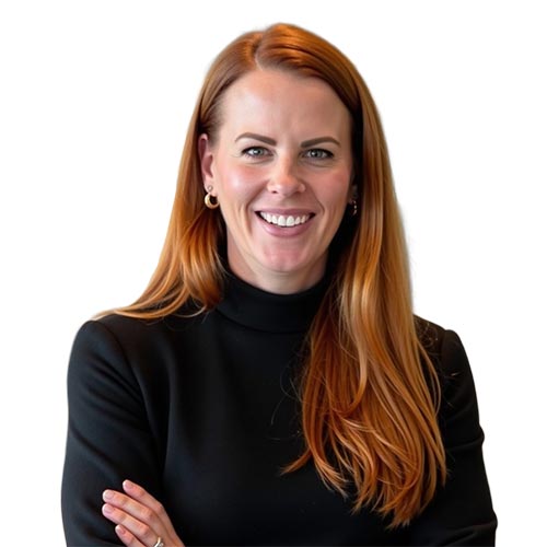Gabby Hodgson; Smiling woman with long red hair and hoop earrings, wearing a black turtleneck, stands with arms crossed against a plain white background. Confident tone.
