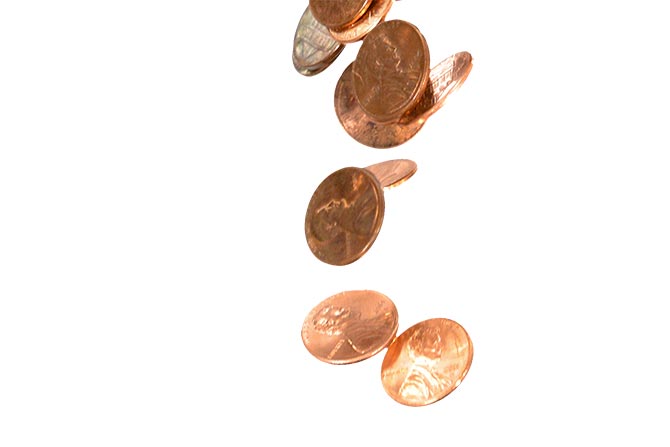 Pennies No Longer in Production Impact Cash Transactions and Sales Taxes; Scattered shiny pennies falling against a white background, conveying a sense of motion and change. The copper coins reflect light softly.